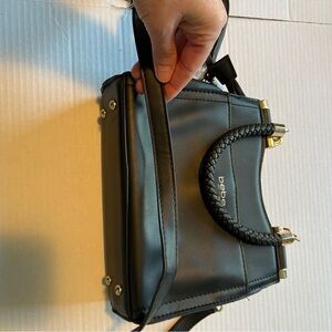 Black and gold Bebe bag purse